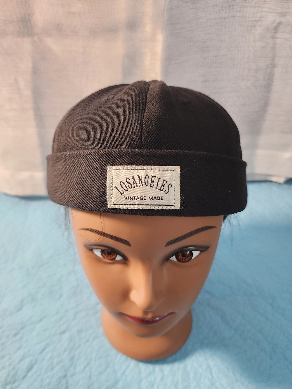 Unisex Vintage Black Docker Cap with Cream Logo Patch